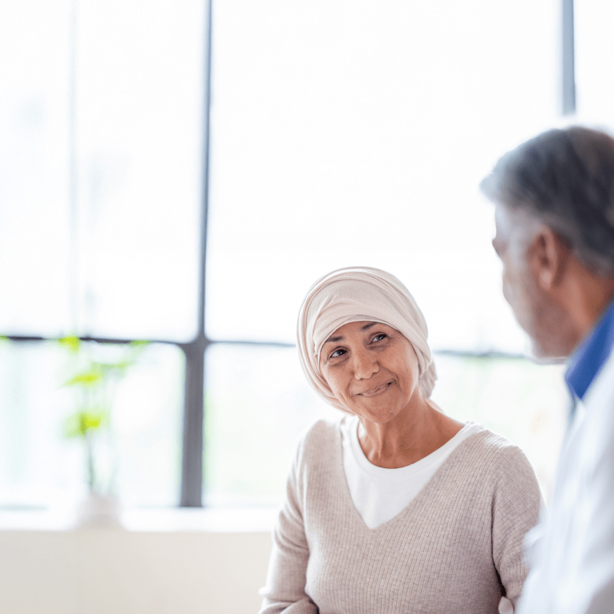 oncology patient with doctor in exam room